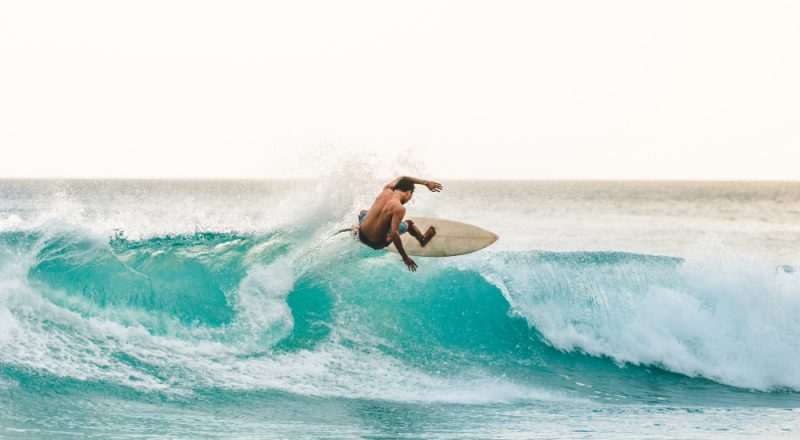male surfing
