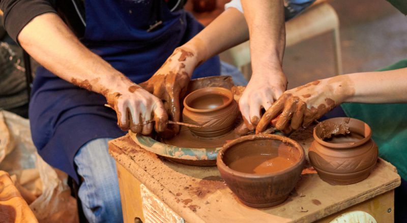 people doing pottery