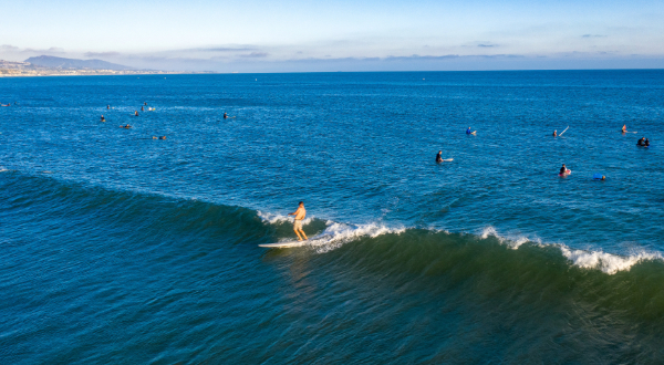 Person surfing at Doheny beach